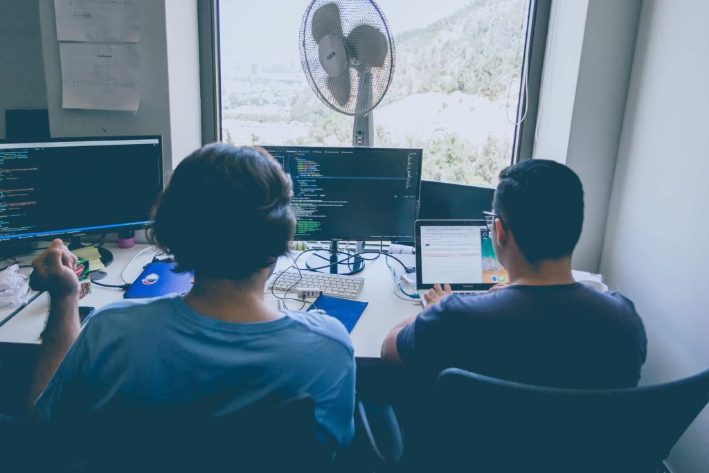 team members coding on forms2